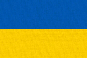 Wall Mural - Flag of Ukraine. Ukrainian flag on fabric surface. National symbol of Ukraine