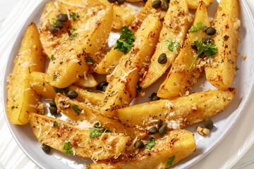 Canvas Print - greek lemon potatoes with garlic, cheese, capers