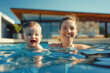 A cute baby with her mother in the pool
