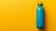 Thermos water bottle with top view. Blue water bottle isolated on yellow background 