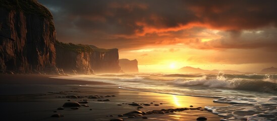 Poster - A beautiful sunset over the beach with a cliff in the background, painting the sky with hues of orange, pink, and purple. The clouds reflecting the warm colors as the sun dips below the horizon