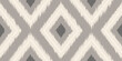 Vector vintage seamless pattern in Ikat style. Vector pattern for home decor in retro style. Retro ikat texture.