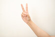 © Barrul Mujib - Hand pointing at something and make a sign on white background