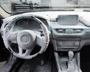 Wall Mural - Car interior in a layer of cleaning foam. 