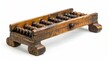 Vintage Chinese abacus isolated on white, representing ancient calculation methods and traditional craftsmanship.