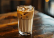 A Glass of Iced Latte on a wooden table, close-up angle view, ultra realistic food photography
