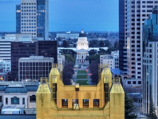 Poster - its aloud to be used in stock photos. paid by tax payers do not need permission to use you can look it up  many stock photos of this bridge and capital building. 