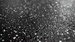 Rain Drops on a Black and White Surface