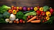 Different fresh vegetables organic on a wooden table seen from top view with copy space area. Healthy and dieting food concept.