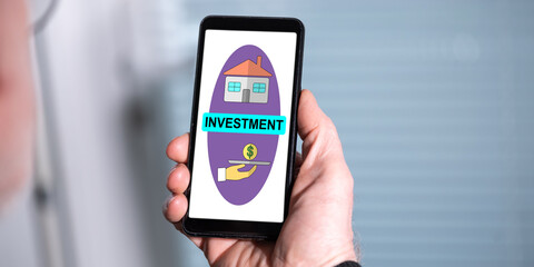 Canvas Print - Investment concept on a smartphone