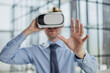 © Katsiaryna - businessman in virtual reality headset in the office