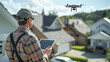 Professional technician using drone to measure and inspect roof