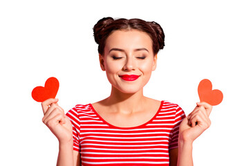 Wall Mural - Close-up portrait of her she nice cute charming attractive glamorous fascinating peaceful girl wearing striped t-shirt holding in hands small little hearts isolated over pink pastel background