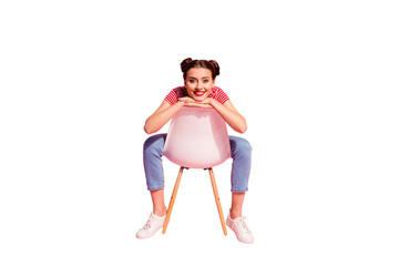 Wall Mural - Nice-looking cute attractive glamorous fascinating lovely shine cheerful cheery girl wearing striped tshirt jeans sitting on chair having free time isolated over pink pastel background