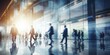 Business background. Many businessmen in a suit walking in a modern enterprise class office building lobby or entrance. Blurred motion