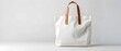 White tote bag cotton mockup on grey background with copy space.