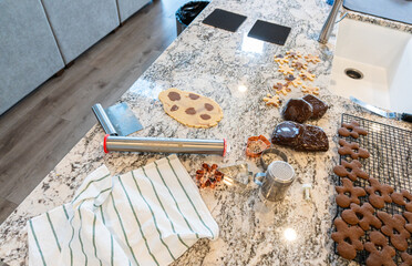 Canvas Print - Baking Christmas Gingerbread Cookies in Modern White Kitchen