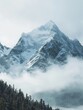 Snow-covered peaks towering above captured through a 35mm lens in cinematic frame