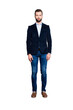 © deagreez - Full size body portrait, snap of attractive trendy teacher with stubble, looking at camera, isolated over grey background, wearing jacket, jeans, shirt