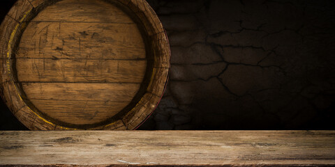 Wall Mural - table background of free space for your wine bottle or food on top and dark retro interior of barrels . High quality photo