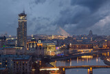 Fototapeta  - Novospassky bridge, Moscow river, House of music and evening panorama of Moscow, Russia