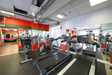 Empty modern gym with many simulators for body-building training