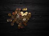 Fototapeta  - Money background with euro cents over black wooden background