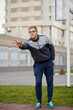 © Pavel Losevsky - Young man petanque player throws ball