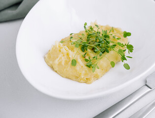 Wall Mural - Bowl with tasty mashed potatoes on top view