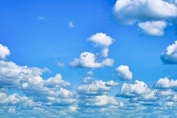 Wall Mural - Sky with large cumulus clouds. Serene background on the theme of calm.