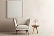 © usman - Comfortable beige chair beside a blank frame on a soft wall.