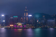 Central Plaza with illumination, shore, mountains and ships in Hong Kong, China at night, view from Starhouse