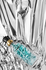 Poster - Perfume on foil background