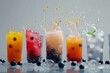 Different bubble teas, Trendy drink, with tapioka and fruit flavour and ice cubes on grey background in a row