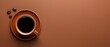 © NOMI - top view of coffee cup on brown background, hot black coffee