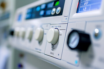 Closeup view of an electronic gadget with buttons and a monitor