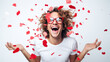 © MP Studio - Man with curly hair and sunglasses, surrounded by red rose petal confetti against a light blue background