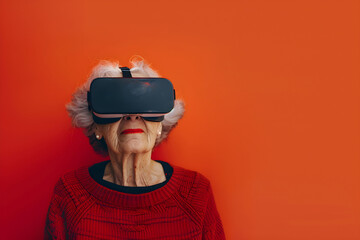 Wall Mural - Senior woman with virtual reality headset. Female in VR glasses on red background. VR, AR, metaverse, future, gadgets, technology, education online, study, video game concept. Futuristic technology