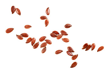 Wall Mural - Group of brown linseeds isolated on a white background, view from above.