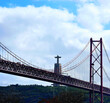 Panorama of Lisbon, April 25 Bridge and the statue of Jesus Christ. background of blue sky and blue clouds. Portugal during beautiful weather