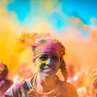 Close-up of marathon runners covered in colored powder