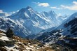 Snowy mountain range with blue sky, a breathtaking natural landscape