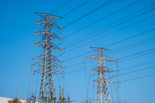 Twin Electrical Transmission Towers And High-voltage Lines In Taiwan