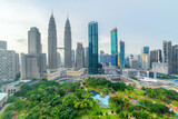 Fototapeta Góry - Kuala Lumpur skyline. Aerial view of a green city park