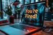 Workforce Turmoil: Dismissal Notice Displayed on Laptop Screen