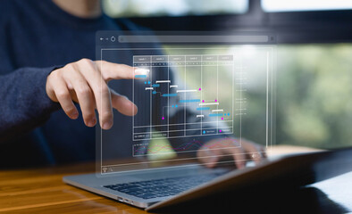 Fototapete - project planner in software, updating and managing milestones on a timeline Gantt chart in technology online. schedule plan management work update and workflow. concept appointment staff of business