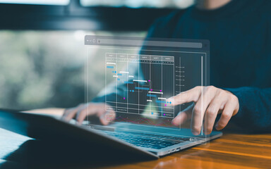 Fototapete - project planner in software, updating and managing milestones on a timeline Gantt chart in technology online. schedule plan management work update and workflow. concept appointment staff of business