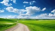 A beautiful landscape unfolds with a road winding through fields under a blue sky adorned with fluffy clouds. Ai Generated.