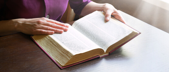 Sticker - Woman's hands holding a bible