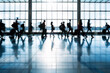 passengers in the lobby of a modern airport with motion blur effect